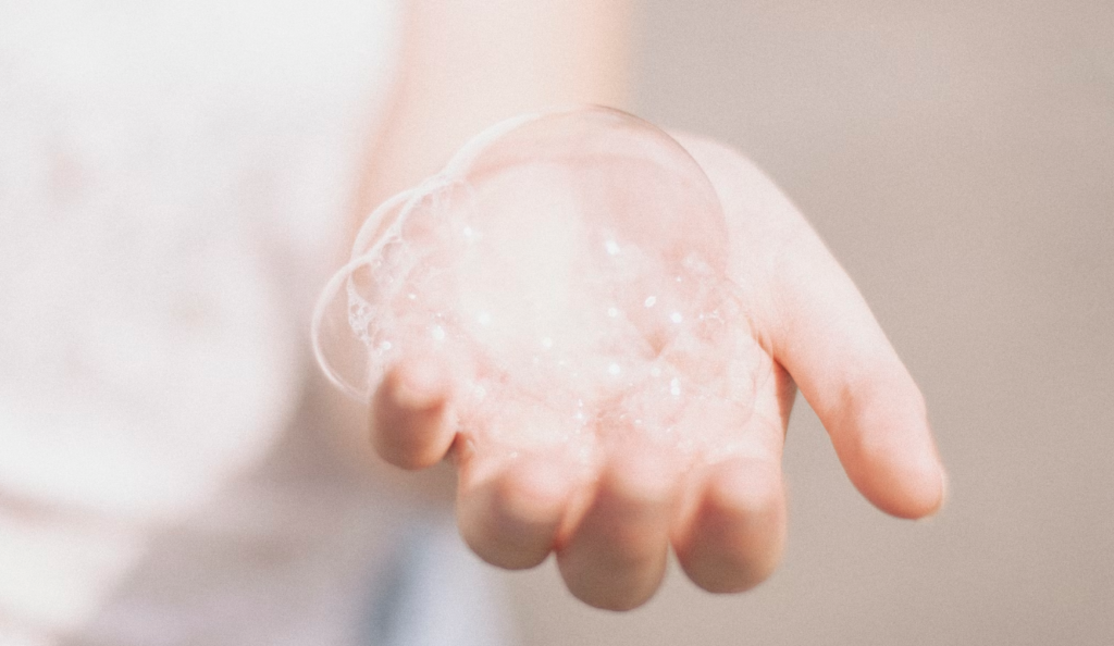 A hand with some soap bubbles 